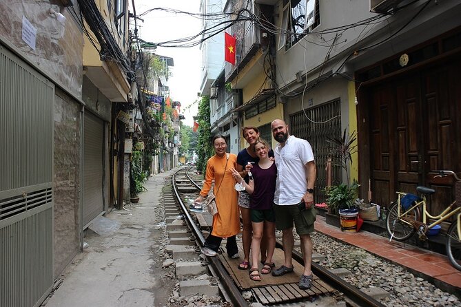 Hanoi Jeep Tours Led By Women: City & Red River Half Day - West Lake, Truc Bach Lake, and a glass of Bia Hoi