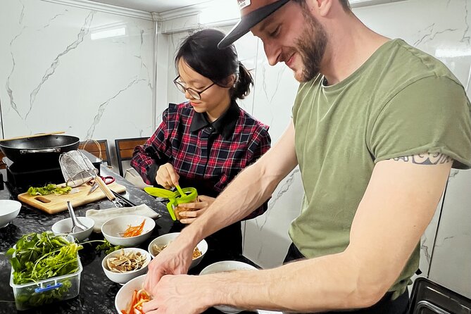 Hanoi Maya Kitchen: Traditional Cooking Class & Market Tour - Balancing the sweet and sour papaya salad