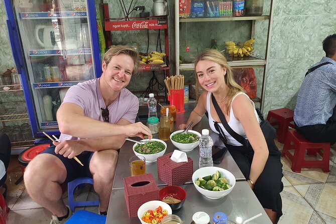 Hanoi Michelin Star Walking Food Tour & Train Street - Learning spring rolls keeps the evening active