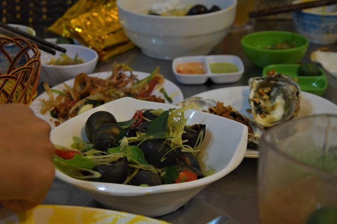 Hanoi Vespa Tours: Hanoi After Dark Vespa Food Tours - Seafood and local eating beyond the center