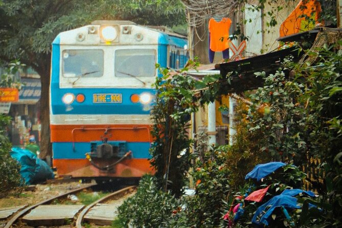 Hanoi Walking Street Food Tour with Train-Street Visit - Bun cha and spring rolls set the tone