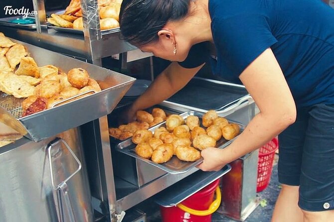 Hanoi Walking Street Food Tour with Train-Street Visit - Banh mi shows Hanoi’s fast-food side