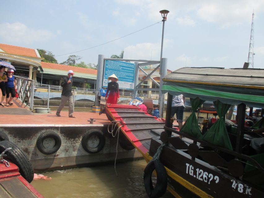 HCMC: Cai Rang Floating Market & Mekong Delta Private Tour - A sampan through the coconut-lined canals