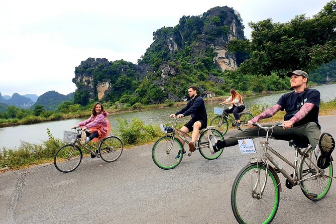 Highlight Ninh Binh Full Day Tour Tam Coc Boat, Mua Cave, Hoa Lu - Cycling through the village countryside
