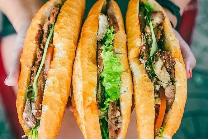 Ho Chi Minh City Street Food Tour & Sightseeing By Motorbike - Seeing local life at Nguyen Thien Thuat apartments
