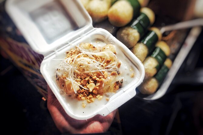 Ho Chi Minh City Street Food Tour & Sightseeing By Motorbike - Flowers, spring rolls, and Ho Thi Ky Market