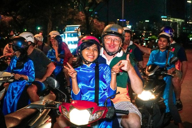 Ho Chi Minh Night Tour by Motorbikes with Female Rider | KissTour - Nguyễn Thiện Thuật apartment buildings and old Saigon life