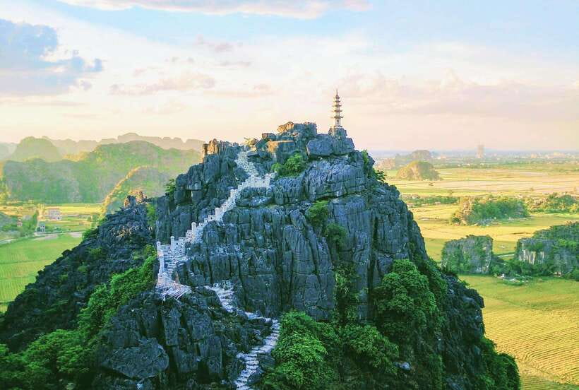 Hoa Lu, Tam Coc, & Mua Cave Day Trip with Lunch & Limousine - Tam Coc by boat, through fields and limestone peaks