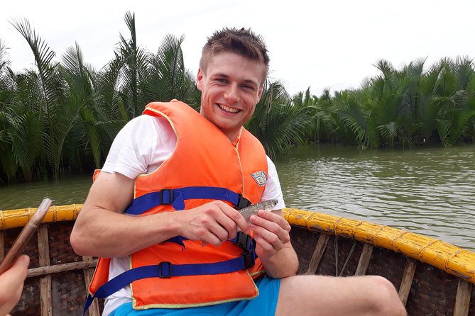 Hoi An Eco Tour Cooking Class & Fishing (Local market,basket boat,learn cooking) - Bay Mau Coconut Forest by basket boat
