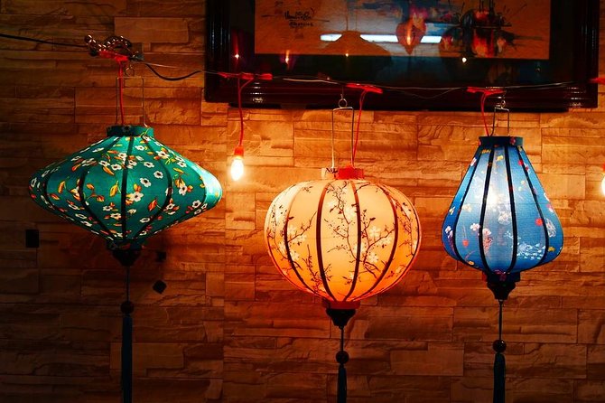 Hoi An Full Lantern Making Class- A special Foldable lantern - Stretching the silk and adding the finishing tassel