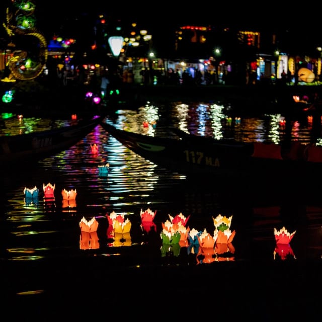 Hoi An Lantern Boat Ride on the Thu Bon River - Making a wish with the floating flower lantern