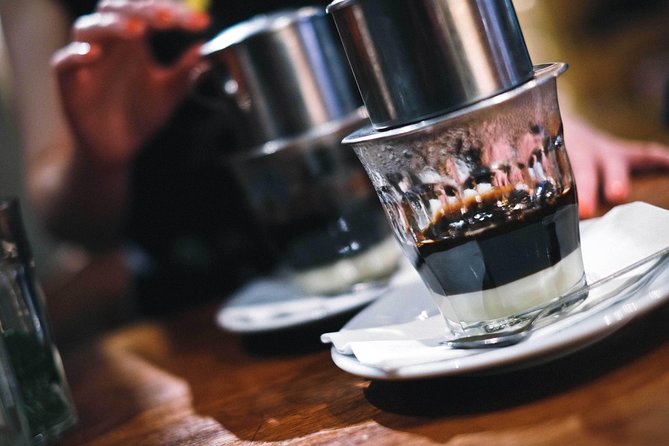Hoi An Street Food Walking Tour with Tastings - Quiet lanes and family kitchens