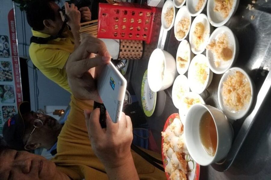 Hue: Night Street Food Tour by Cyclo with a Local Guide - Crossing Truong Tien Bridge