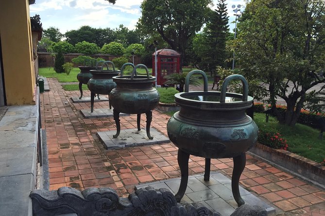 Imperial Hue And Hai Van Pass Full-day Tour - A short Perfume River boat ride