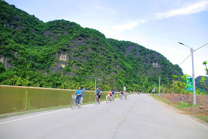 Luxury Hoa Lu Tam Coc Mua Cave Amazing View 1 Day Tour - Food, water, tea, and the Vietnamese hat