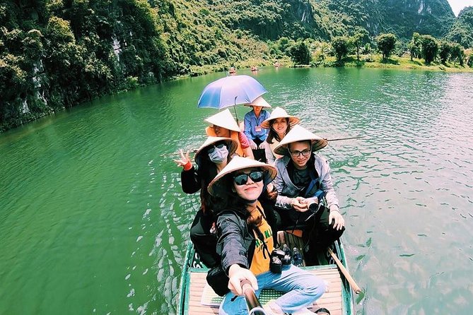 Luxury Ninh Binh Tour to Tam Coc, Mua Cave, Bich Dong Pagoda - Bich Dong Pagoda against the mountain