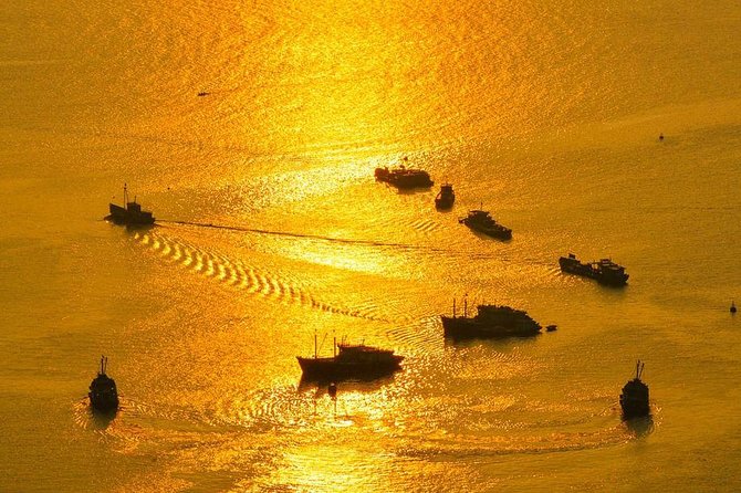 Magical Sunset and Evening with glowing plankton by Cat Ba Local - Returning through the bay after dark