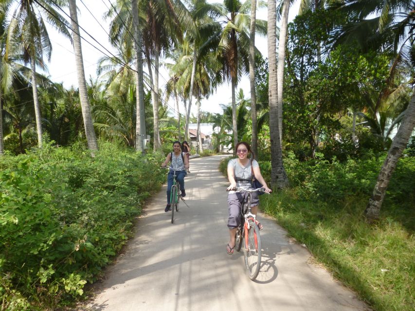 Mekong Day Tour by Car:Cai Be market, Local Island & Cycling - The sampan through Cái Bè’s small canals