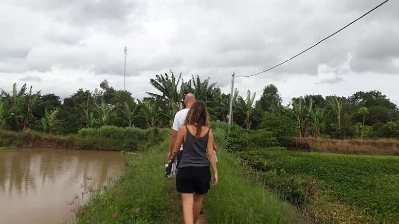 Mekong Day Tour by Car:Cai Be market, Local Island & Cycling - A home-cooked lunch at noon