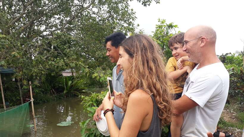 Mekong Day Tour by Car:Cai Be market, Local Island & Cycling - The guide and private format