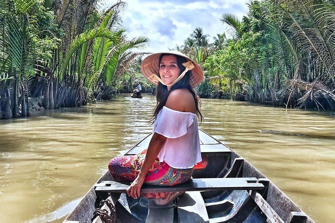 Mekong Delta & Cai Rang Floating Market 2-Day Tour from HCMC - Coconut candy, fruit, honey tea, and folk music