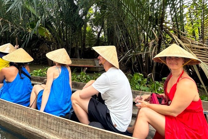 Mekong Delta Guided Tour from Ho Chi Minh City - Island life, tropical fruit, and traditional music