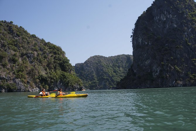 Most favorite full day boat tour with kayaking in Lan Ha bay, Ha Long bay - Kayaking through the Dark-Bright Caves