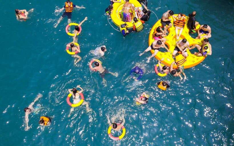 Nha Trang: Hopping Tour, Snorkeling, Boat Party, & BBQ Lunch - The floating party, swimming, and boat slide