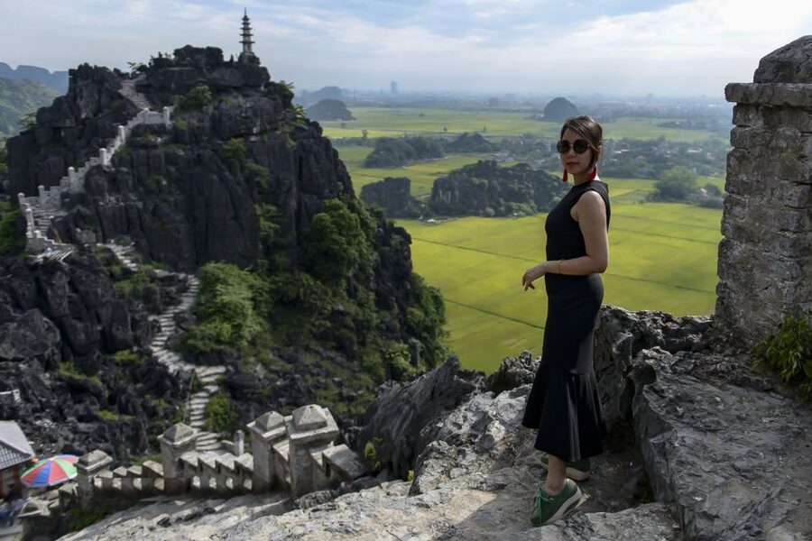 Ninh Binh Daily: Hoa Lu, Mua Cave, Tam Coc, Bike & Swimming - Cycling through villages to Thai Vi Temple