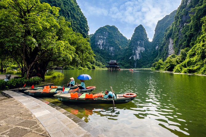 Ninh Binh Day Trip: Hoa Lu-Trang An/Tam Coc-Mua Cave-Cycling-Boat - Trang An’s grottoes by bamboo boat