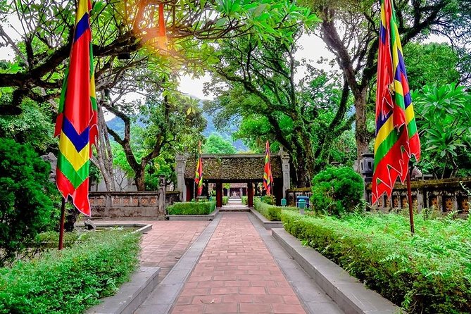 Ninh Binh Tour: Deluxe & Small Group Tam Coc Hoa Lu - Boat, Biking, Buffet Lunch - The limousine bus and the long Hanoi return