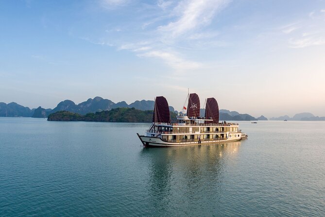A cruise boat among the limestone islands of Ha Long Bay