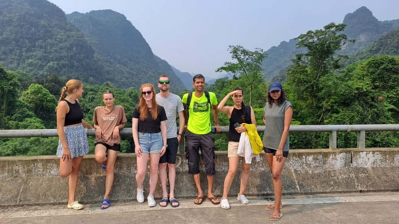 Phong Nha: Cave Exploration and Zipline Dark Cave Tour - Paradise Cave: impressive formations, real walking