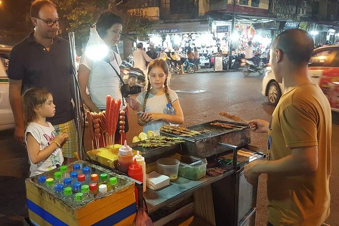 Private Hanoi Street Food Walking Tour With Real Foodie - Walking through Hanoi’s food-filled lanes