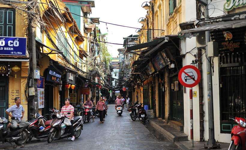 Private Hanoi Walking Tour with visit Train Street - Dong Xuan Market, where Hanoi gets practical