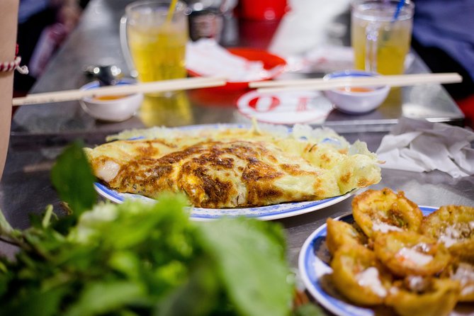 Private Street Food Motorbike Tour in Ho Chi Minh City - District 10: Flowers, Night Food, and a Change of Pace