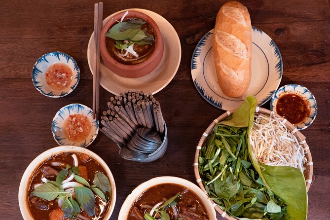 Private Street Food Motorbike Tour in Ho Chi Minh City - District 4: Seafood, Barbecue Alternatives, and Flan