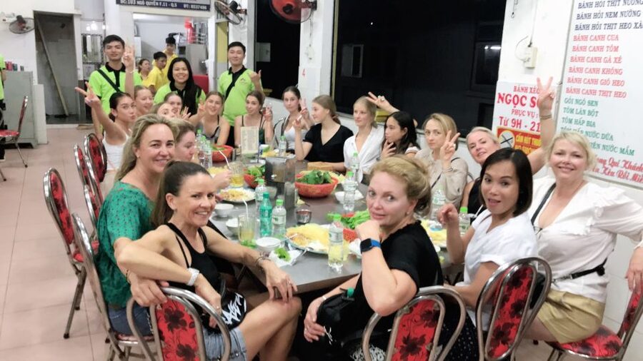 Saigon: Day-Night Sights & Local Food Tour l Female Option - District 7 and the Starlight Bridge