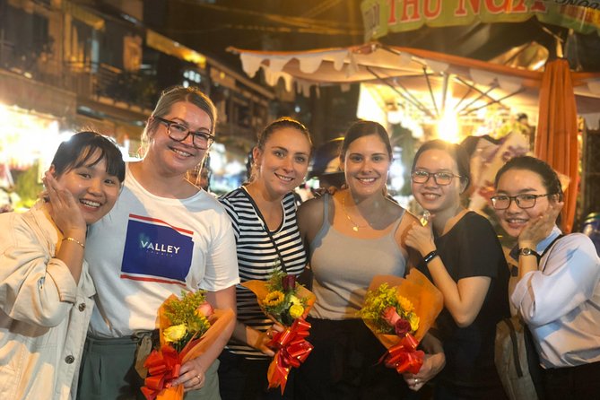 Saigon Evening Food Tour by Scooter - District Hopping and Local Food Streets
