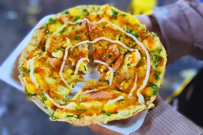 Saigon Food Tour by Scooter with Eleven Tastings - Ho Thi Ky Flower Market and Saigon street snacks