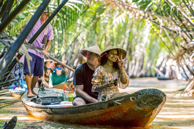 Small-Group Mekong Delta Day Trip: Boat Ride, Cottages & Pagoda - Cruising past Rach Mieu Bridge on the Mekong