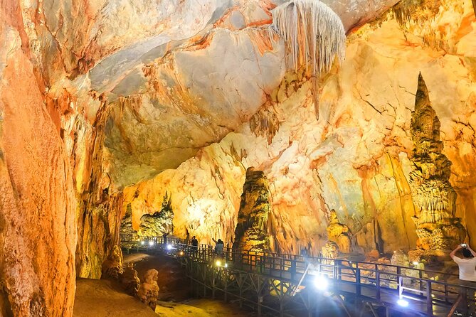 Tour to the caves ONE DAY tour to Phong Nha and Paradise caves - Phong Nha Cave brings water into the picture