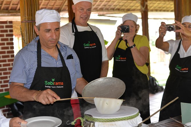 Traditional Cooking Class with Basket Boat Ride and market Tour - Cruising the Thu Bon River toward Bay Mau