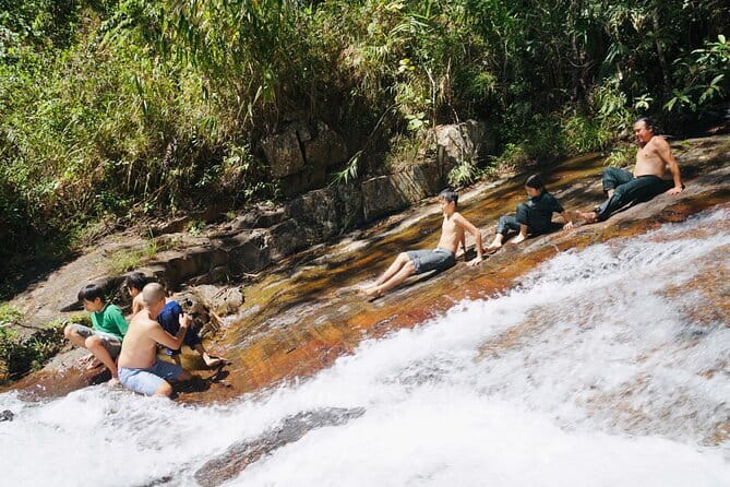 Trekking Tour to Hidden Waterfall & Sturgeon Farm for dog-lovers - Walking with seven dogs through the forest