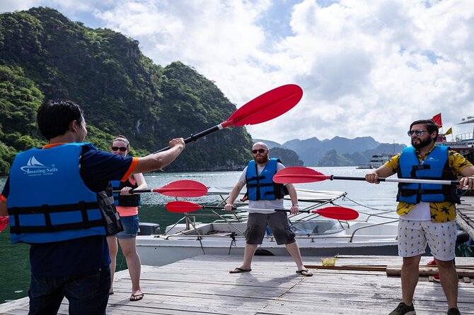Unique Halong Private Day Cruise - Fishing Village, Kayak - The guide can turn scenery into a story