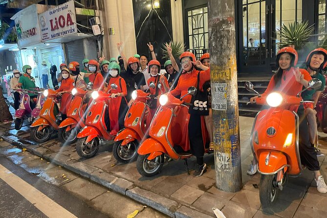 Vespa Female Ao Dai riders Night Street Food + See Train Street - Starting in the Old Quarter at 6 p.m.