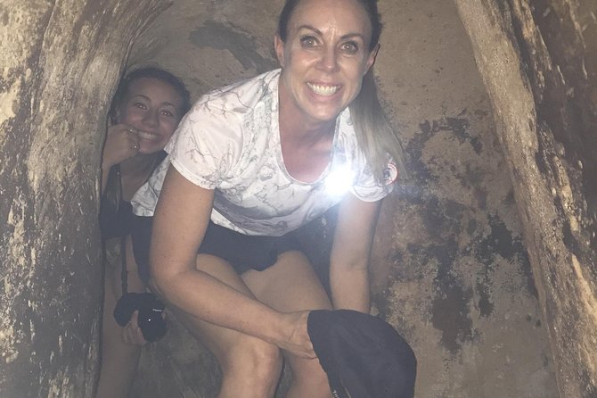 VIP Tour Cuchi Tunnels & Mekong Delta Cruise Full Day Group 12pax - Entering the Cu Chi Tunnels after a 90-minute drive
